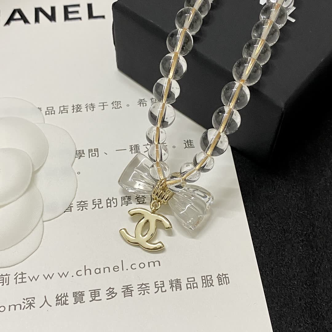 Chanel Crystal Beaded Necklace with Bow and Logo Pendant