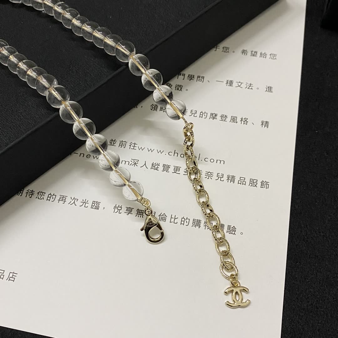 Chanel Crystal Beaded Necklace with Bow and Logo Pendant