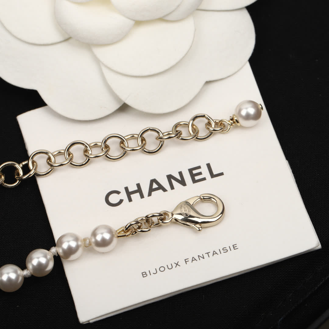 Chanel Pearl and CC Logo Necklace