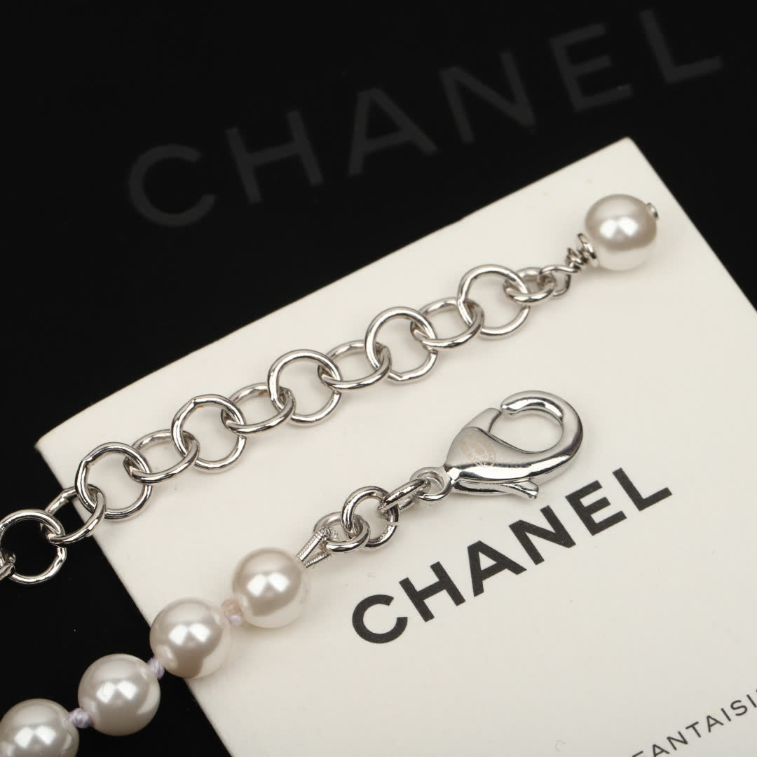 Chanel Pearl Necklace with CC Logo and Green Gemstone