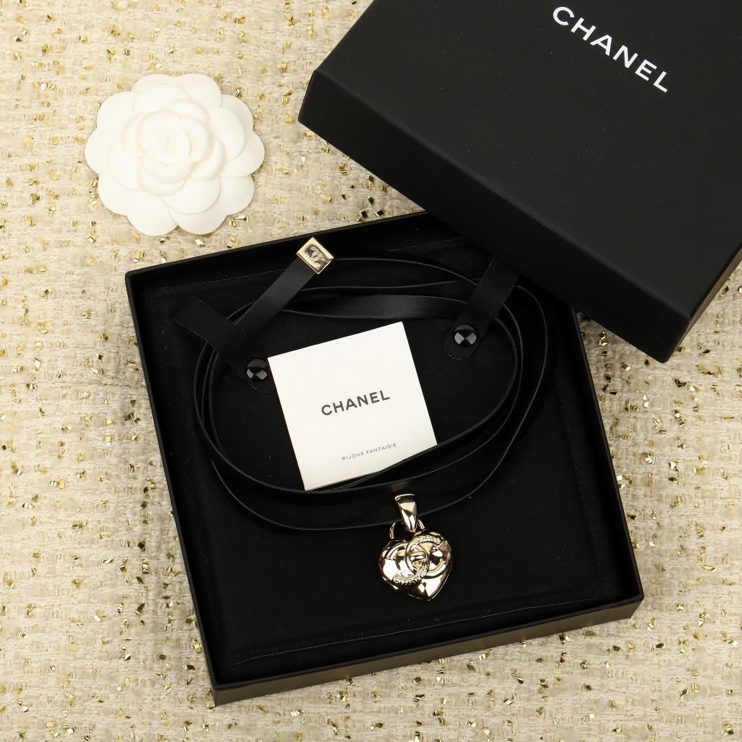 Chanel Black Leather Necklace with Gold Heart Pendant Chanel Black Leather Necklace with Gold Heart Pendant