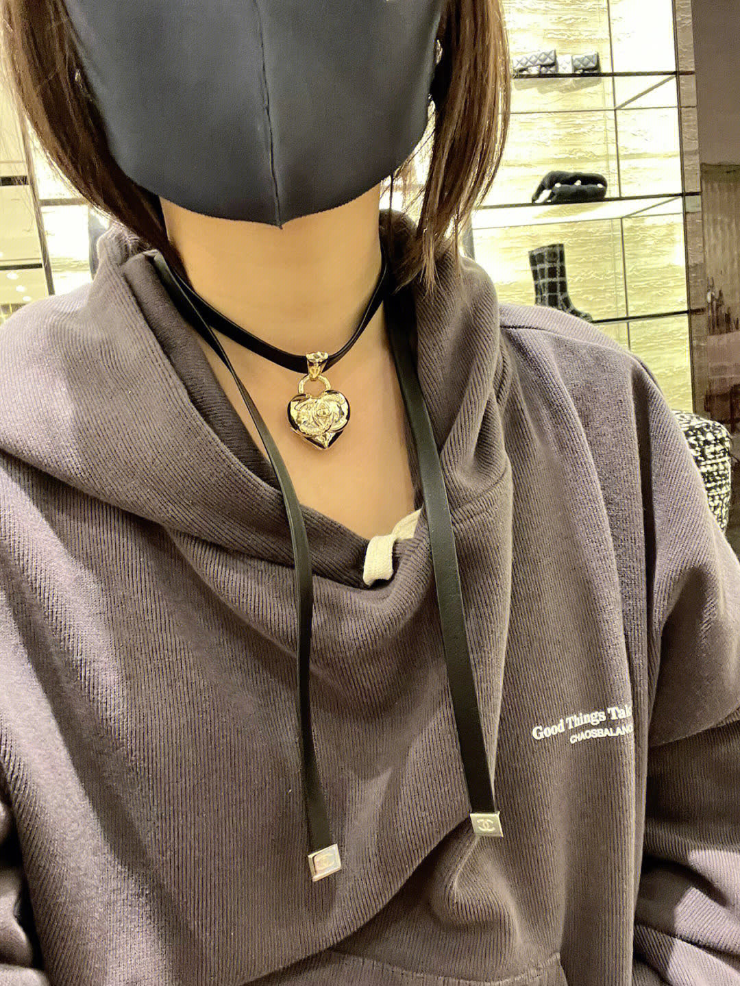 Chanel Black Leather Necklace with Gold Heart Pendant