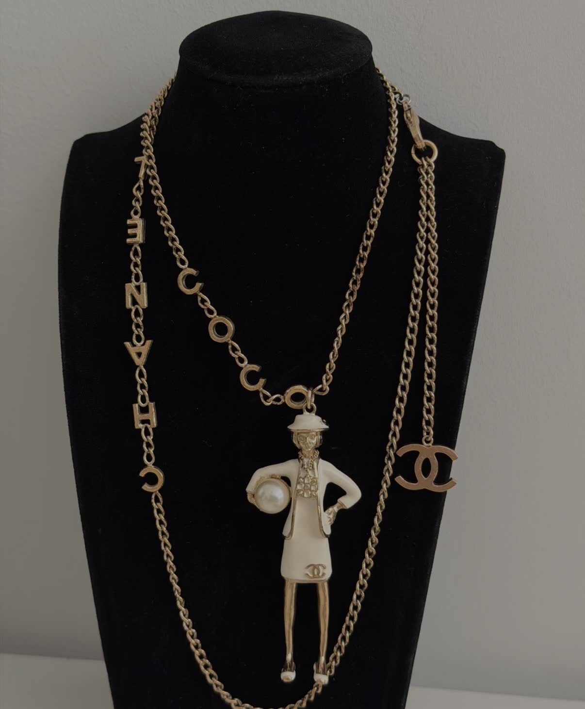 Chanel Gold Tone White Enamel Figurine Necklace