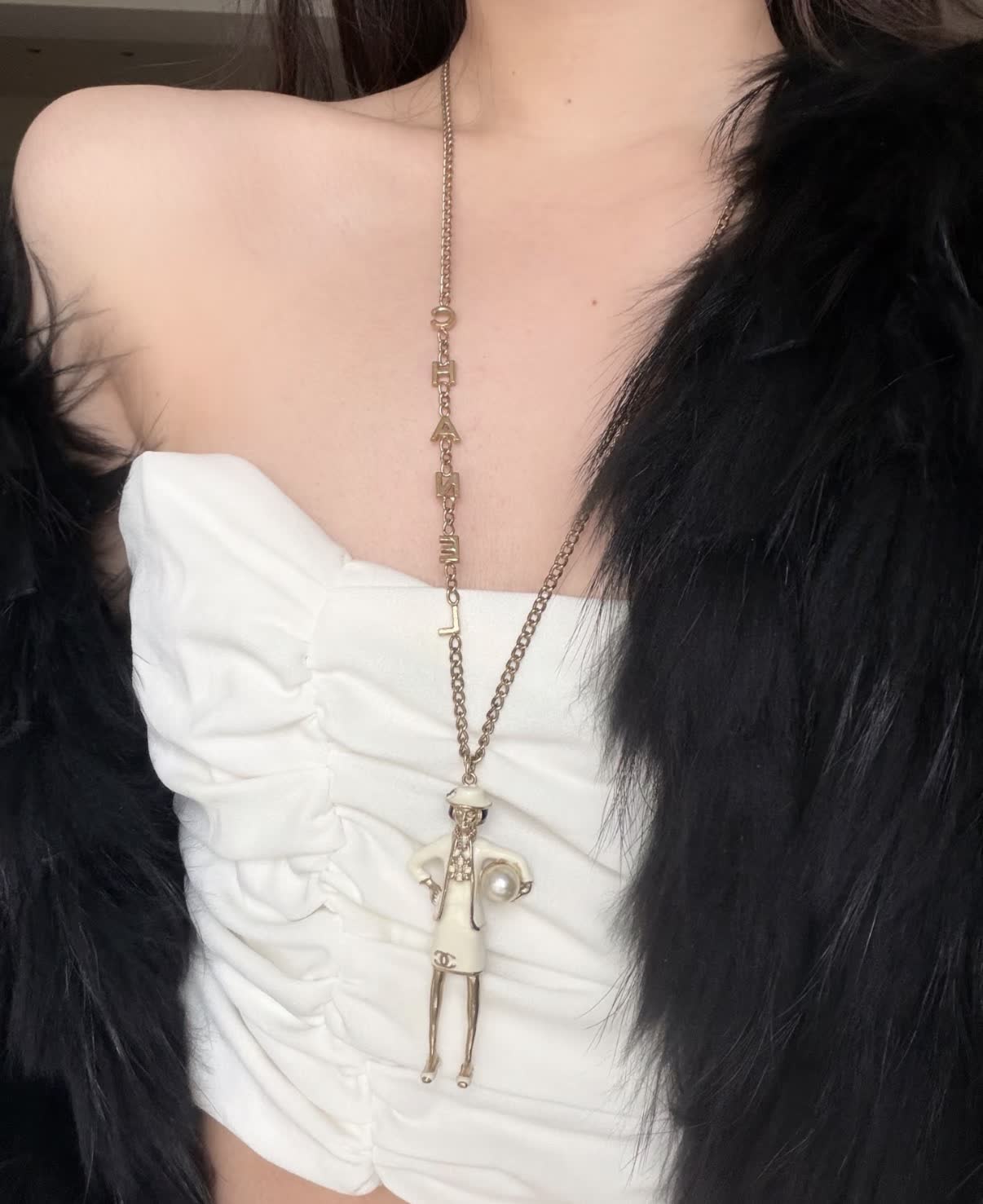 Chanel Gold Tone White Enamel Figurine Necklace