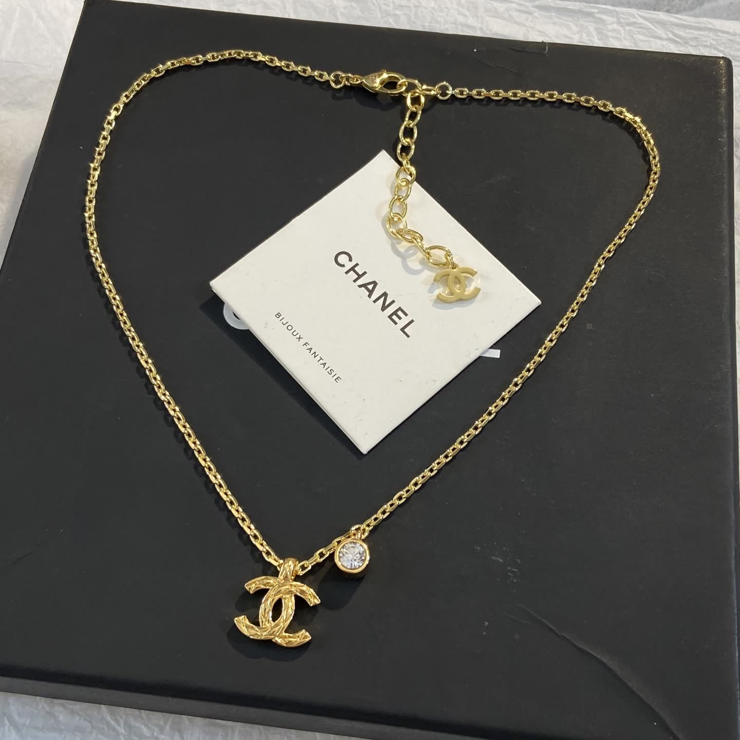 Chanel CC Logo Gold Tone Necklace with Crystal Charm