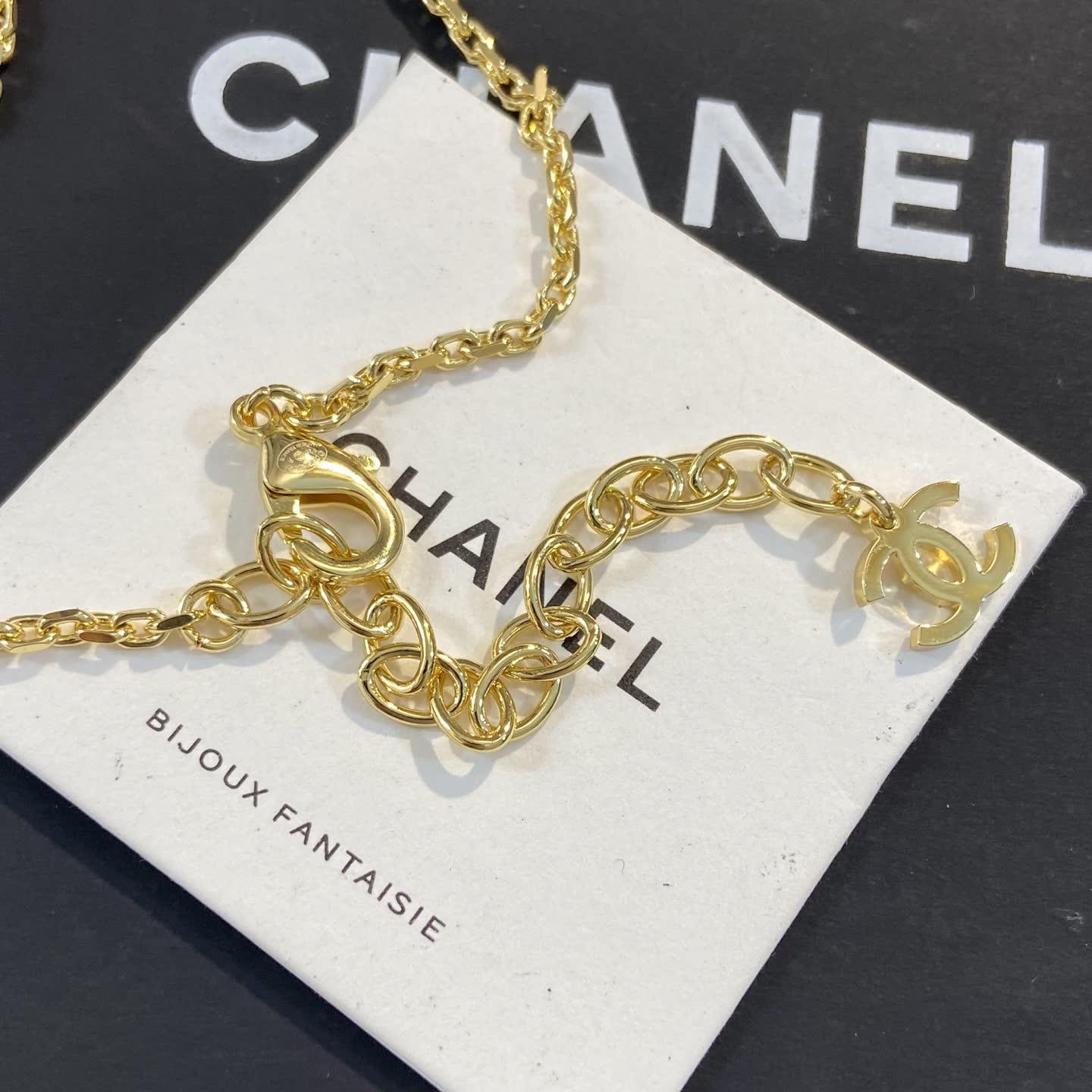 Chanel CC Logo Gold Tone Necklace with Crystal Charm