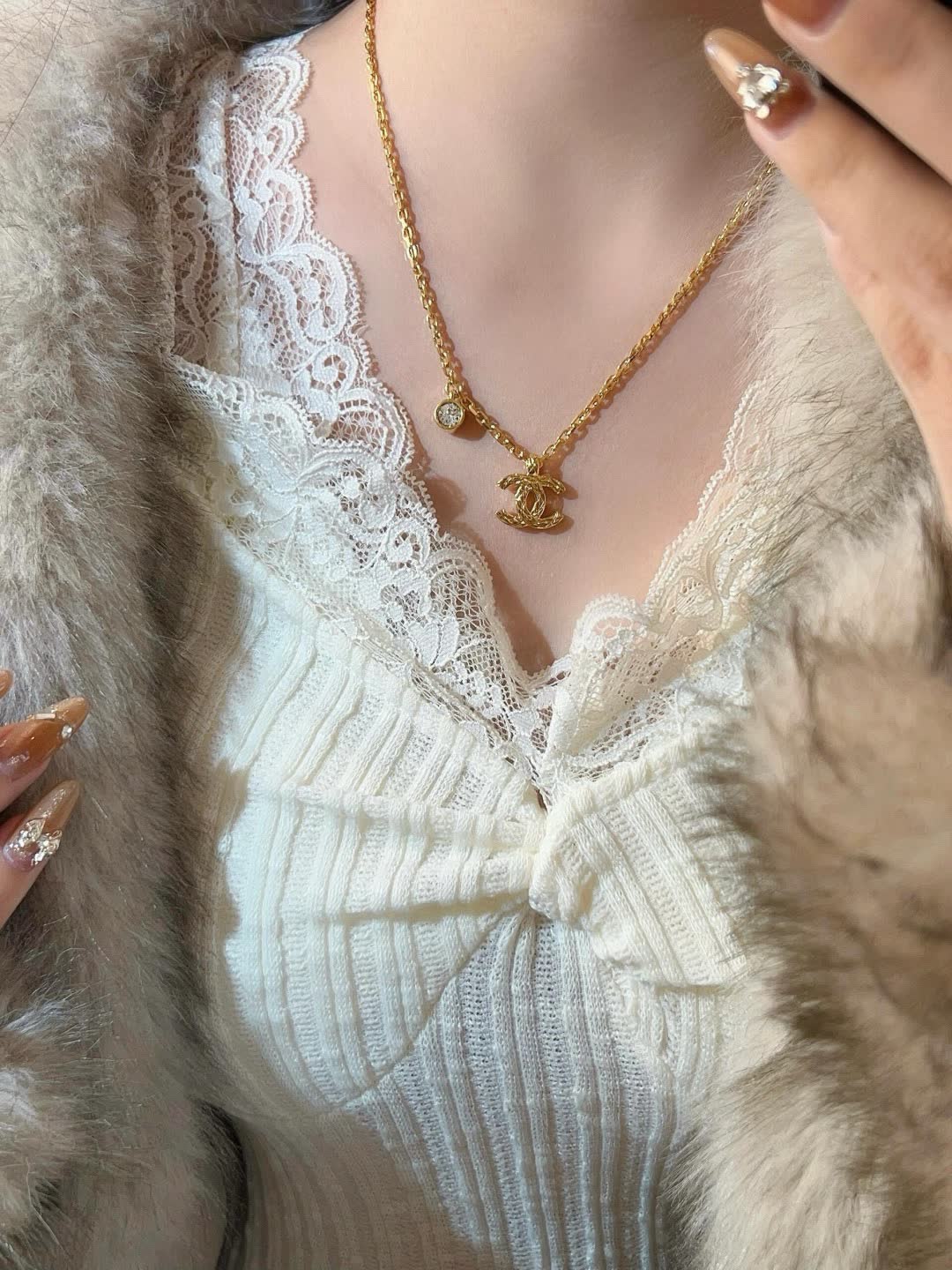 Chanel CC Logo Gold Tone Necklace with Crystal Charm