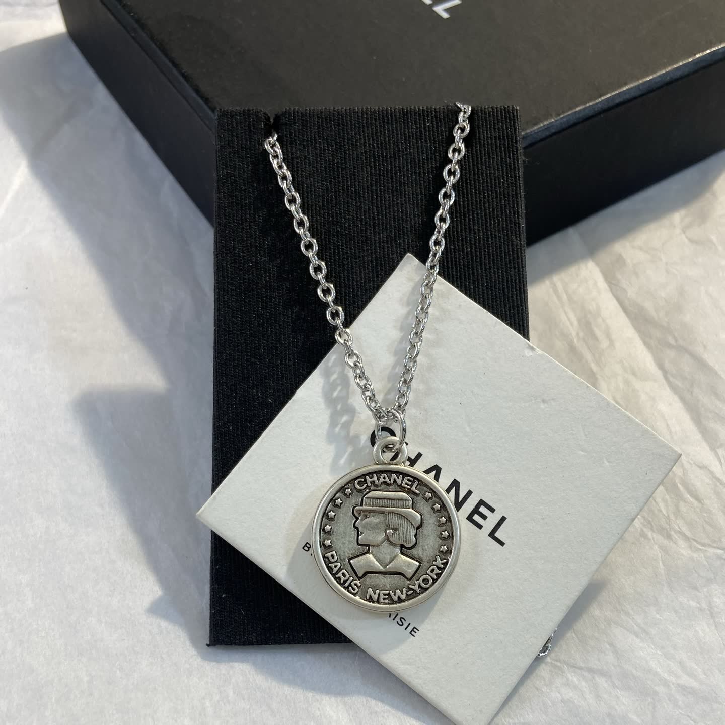 Chanel Paris New York Coin Pendant Necklace