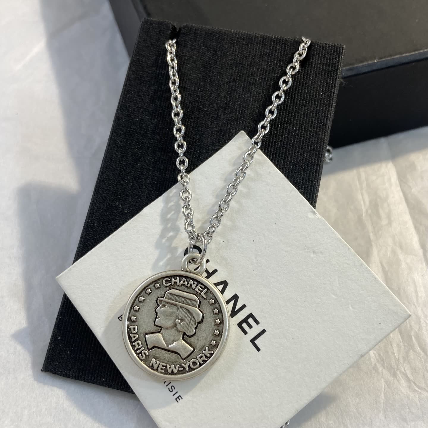 Chanel Paris New York Coin Pendant Necklace