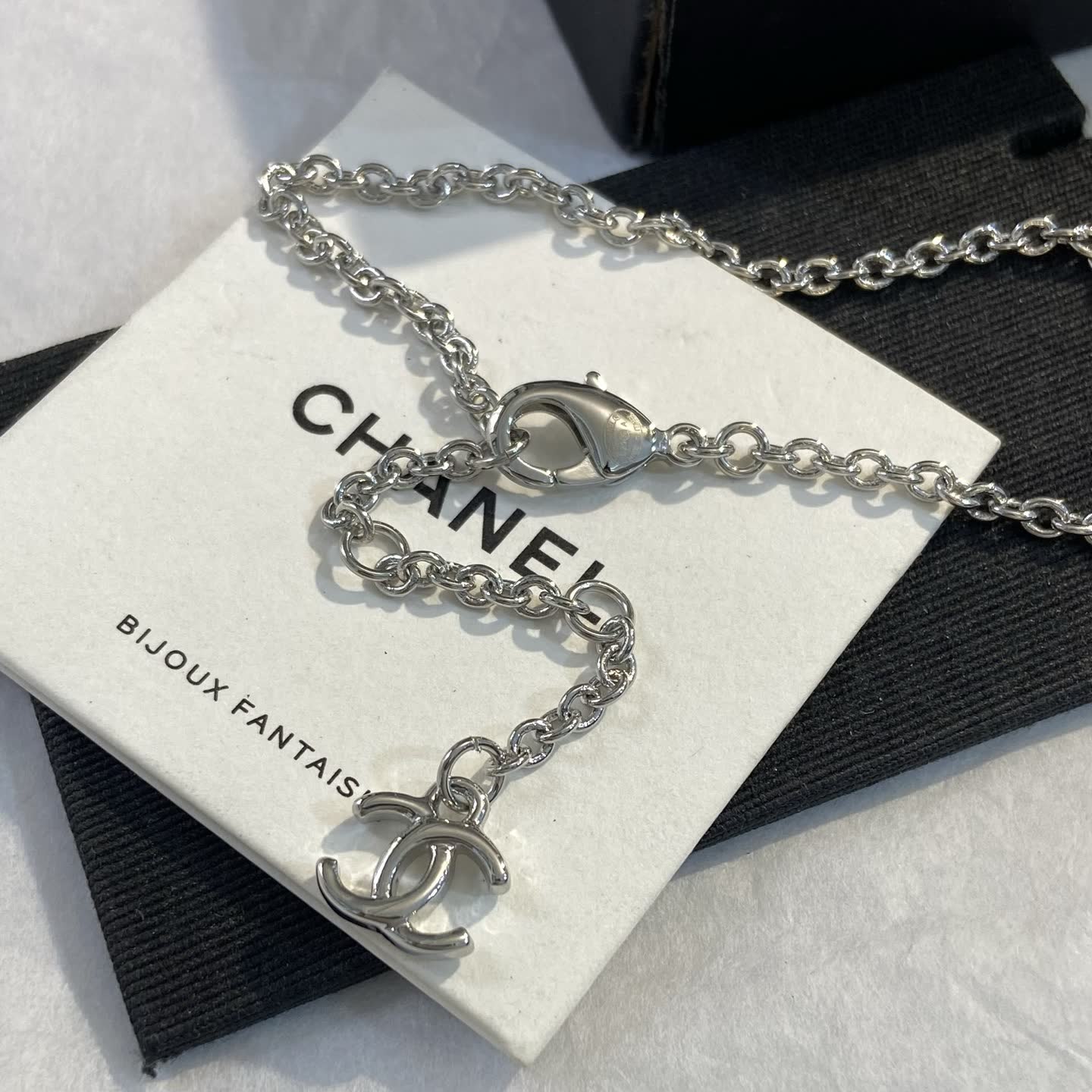 Chanel Paris New York Coin Pendant Necklace