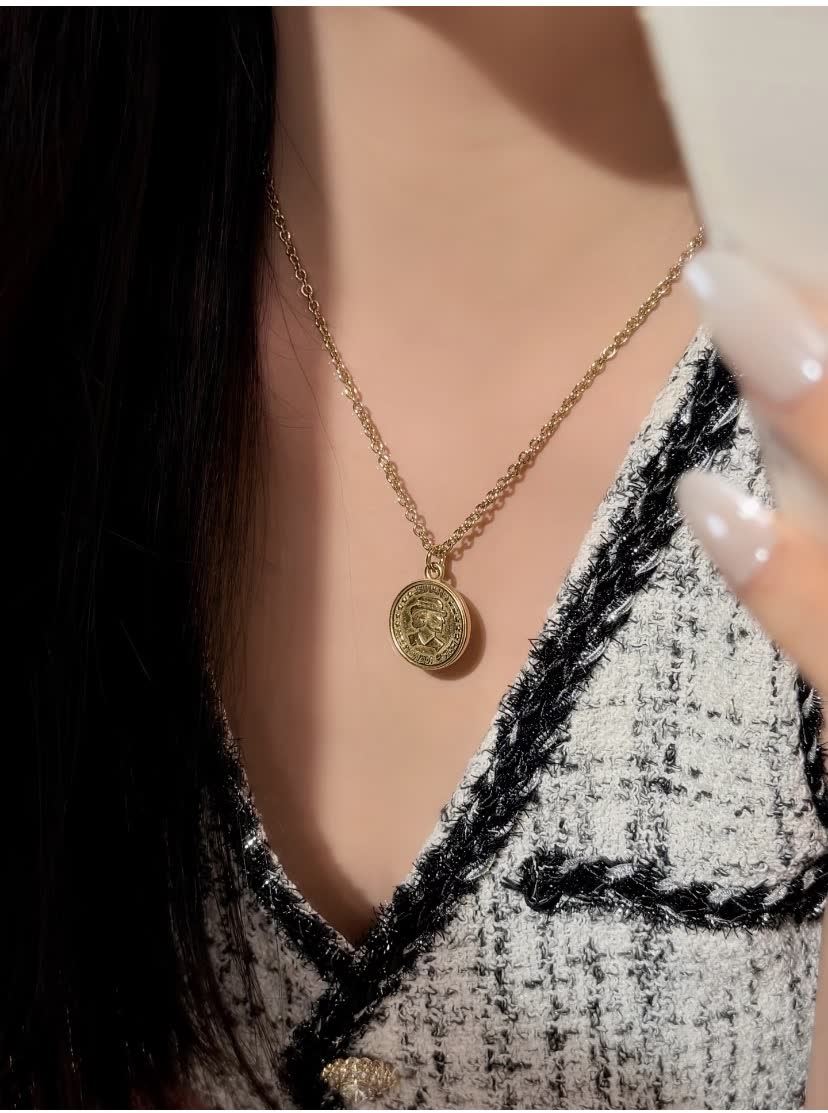 Chanel Paris New York Coin Pendant Necklace