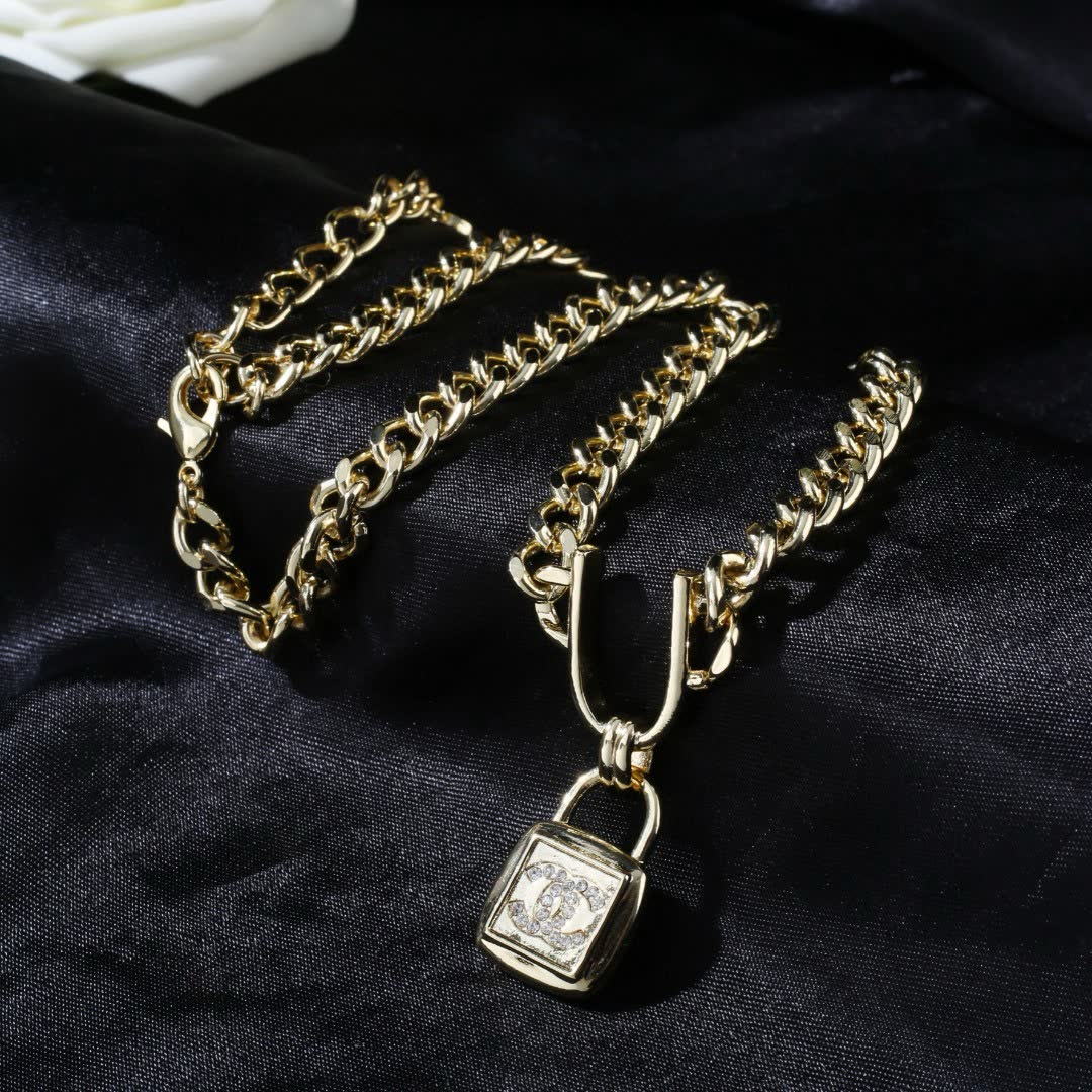 Chanel Gold Chain with Lock Pendant