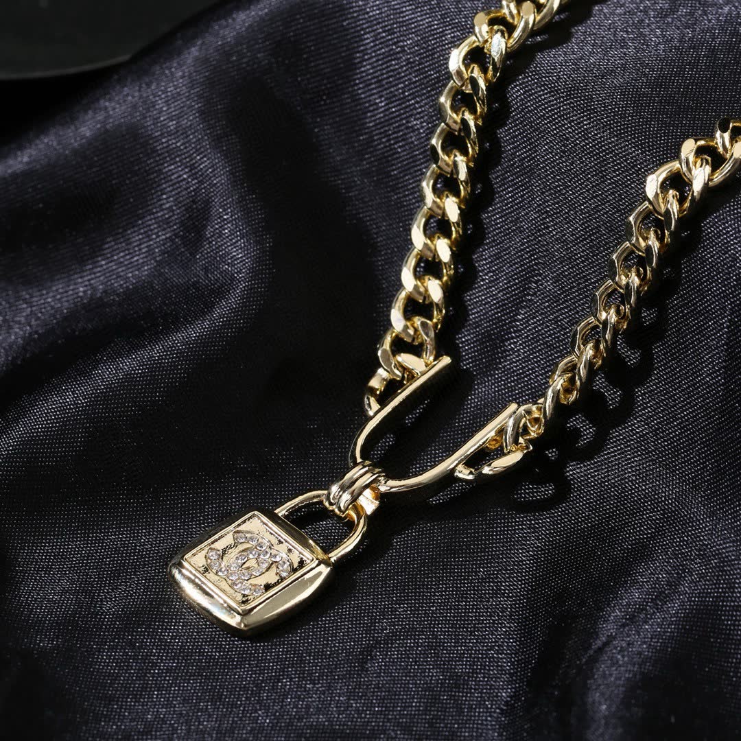 Chanel Gold Chain with Lock Pendant