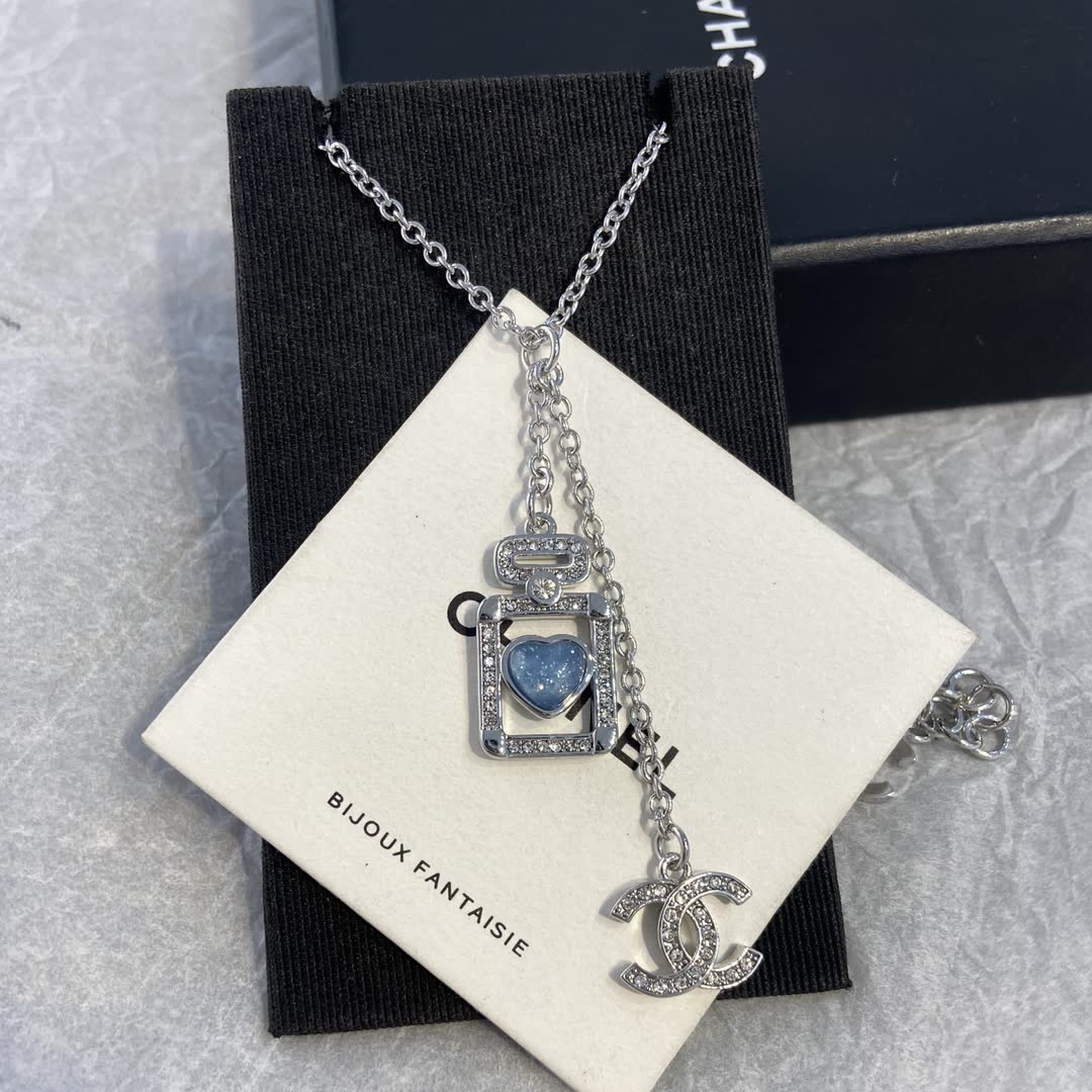 Chanel Silver Necklace with Blue Stone Pendant
