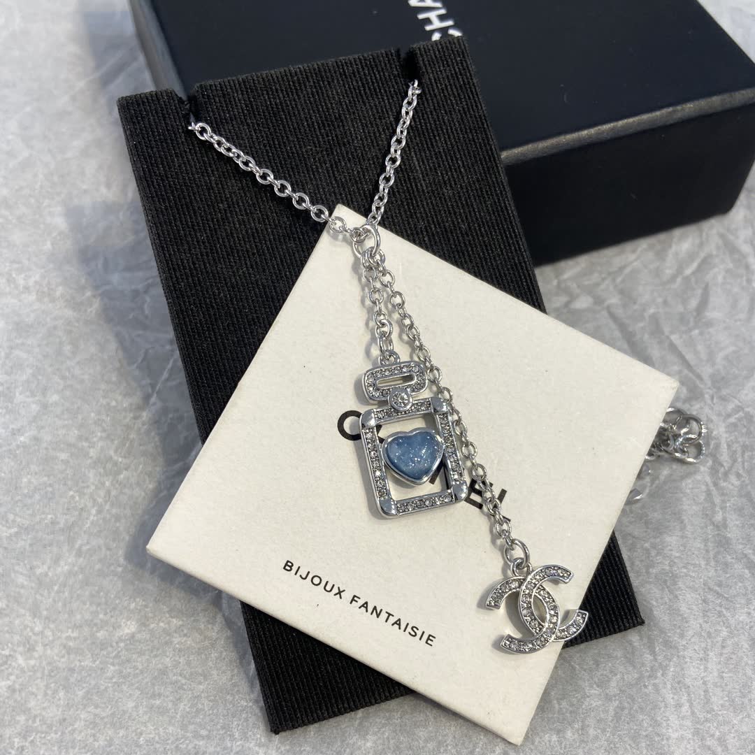 Chanel Silver Necklace with Blue Stone Pendant