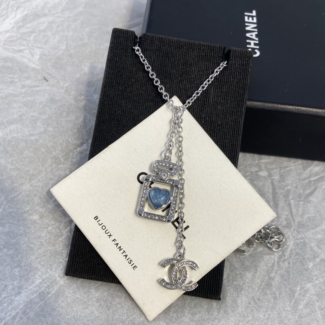 Chanel Silver Necklace with Blue Stone Pendant