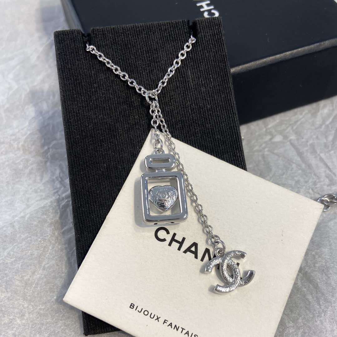 Chanel Silver Necklace with Blue Stone Pendant