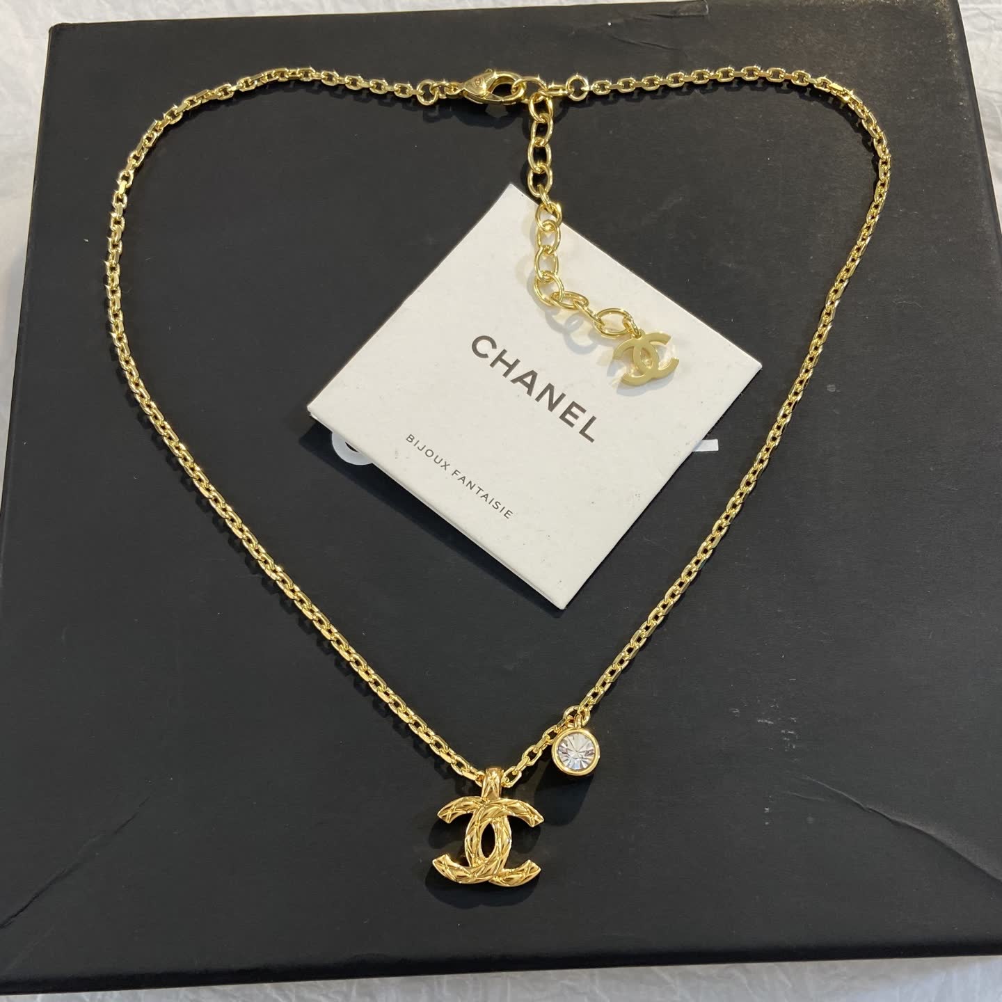 Chanel CC Logo Gold Tone Necklace with Crystal Charm