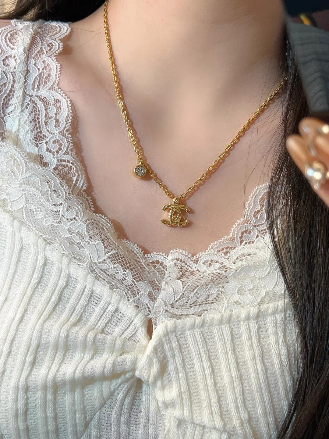Chanel CC Logo Gold Tone Necklace with Crystal Charm