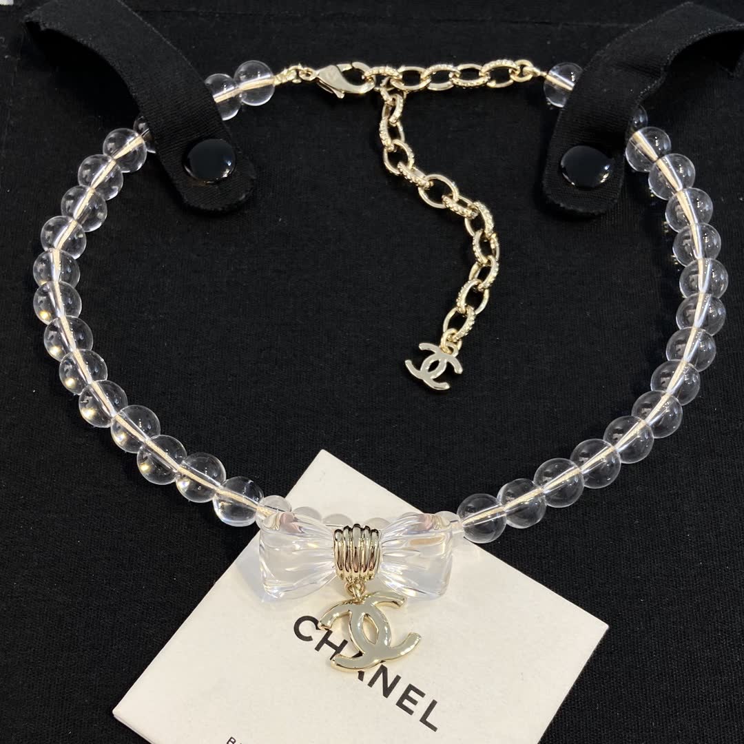 Chanel Clear Beaded Necklace with Bow and CC Logo