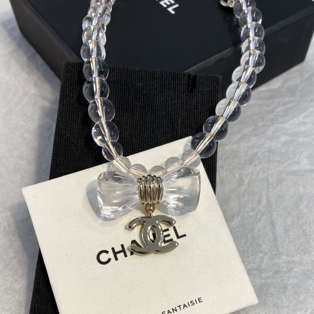 Chanel Clear Beaded Necklace with Bow and CC Logo