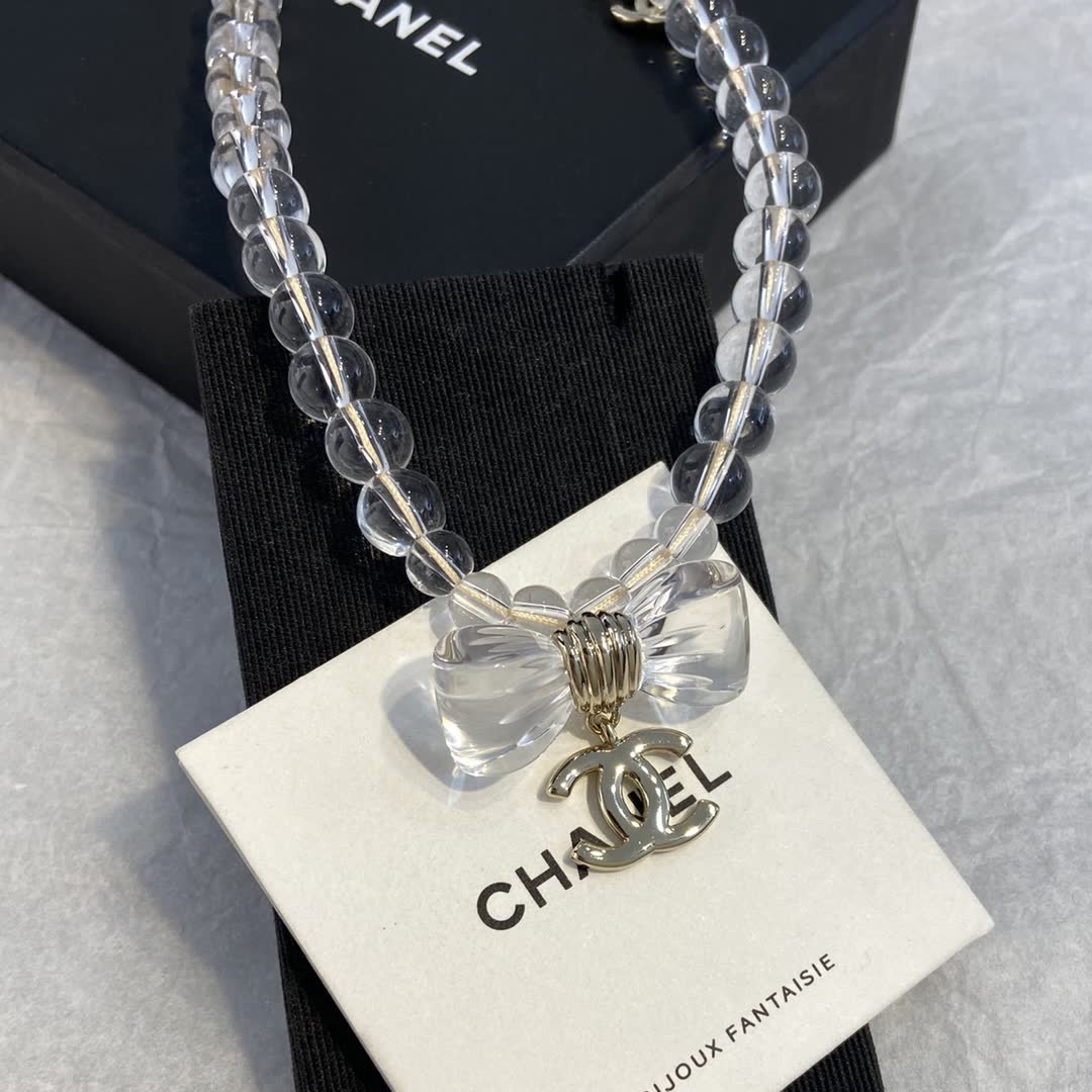 Chanel Clear Beaded Necklace with Bow and CC Logo