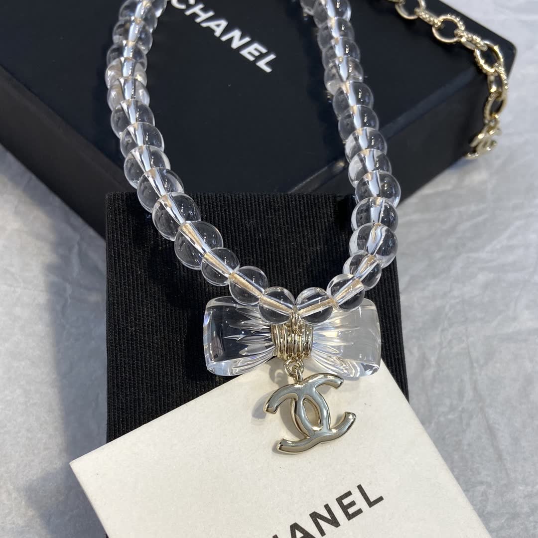 Chanel Clear Beaded Necklace with Bow and CC Logo