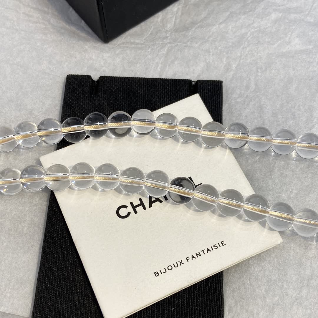 Chanel Clear Beaded Necklace with Bow and CC Logo
