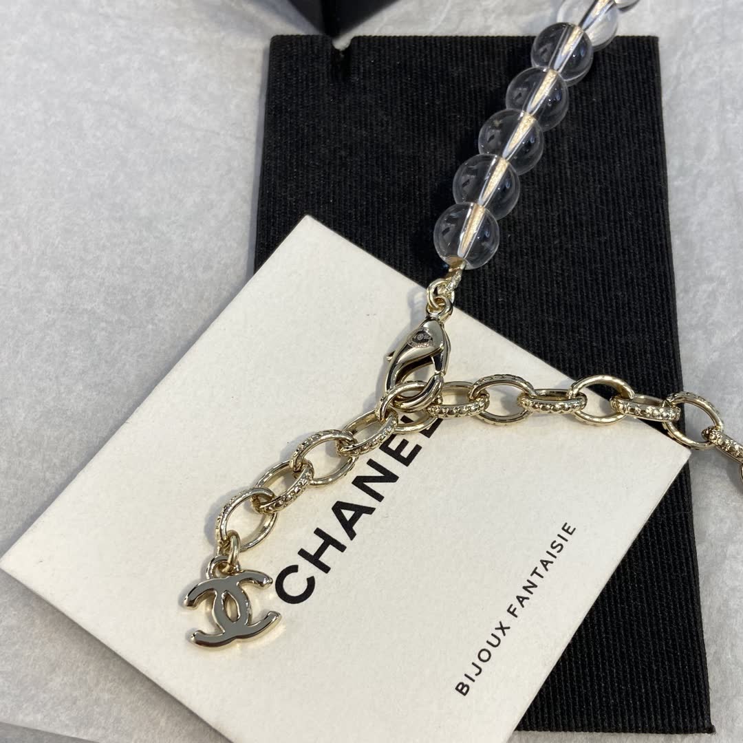 Chanel Clear Beaded Necklace with Bow and CC Logo