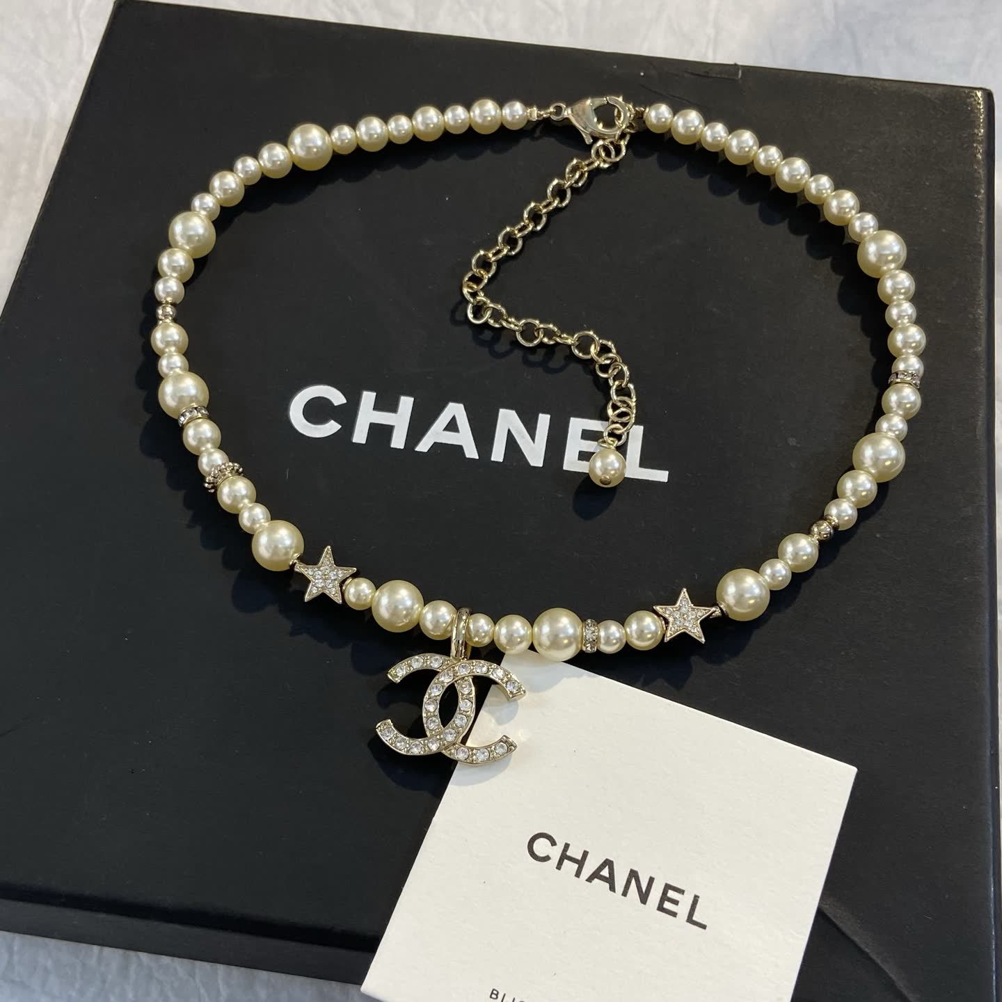 Chanel Pearl Necklace with CC Logo and Stars