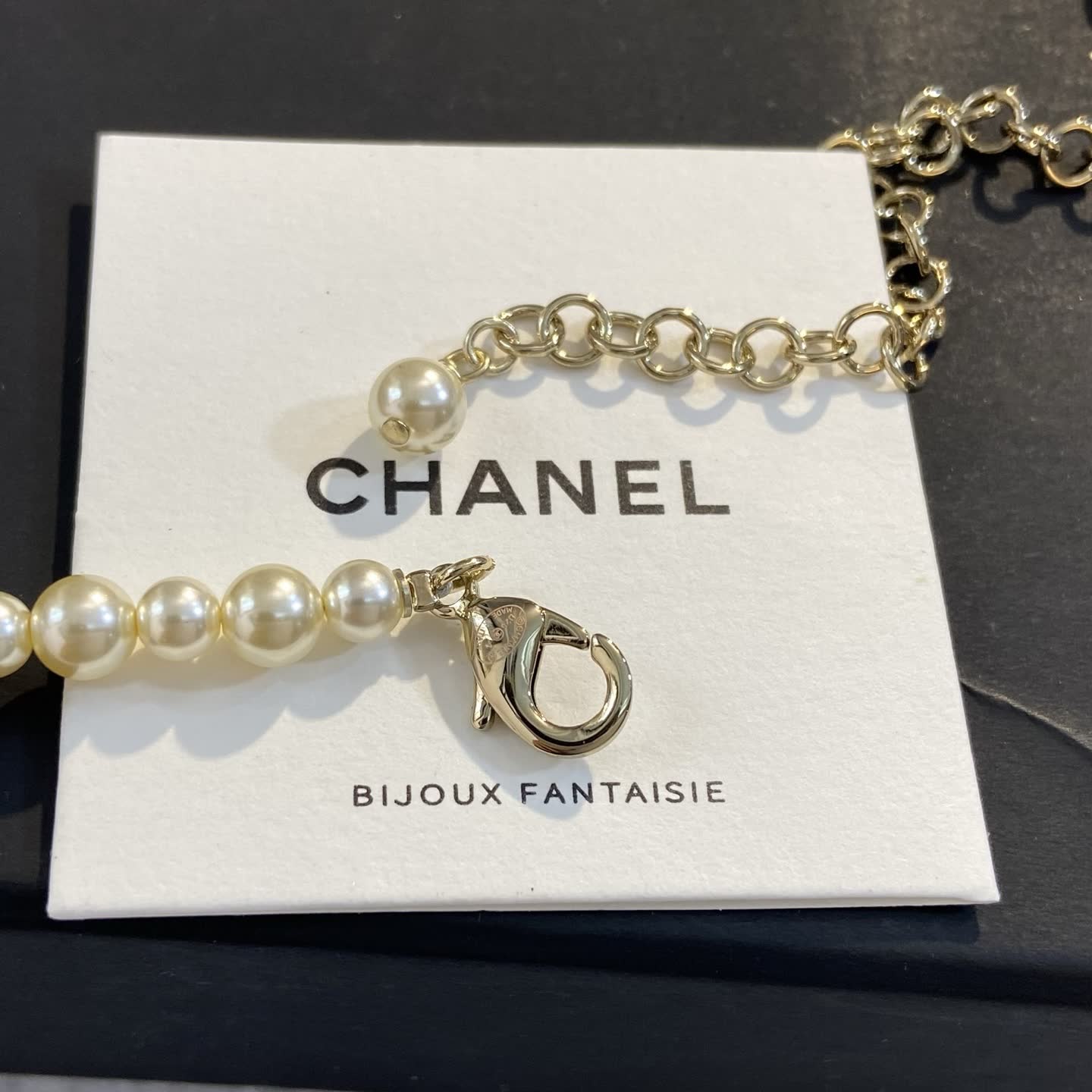 Chanel Pearl Necklace with CC Logo and Stars
