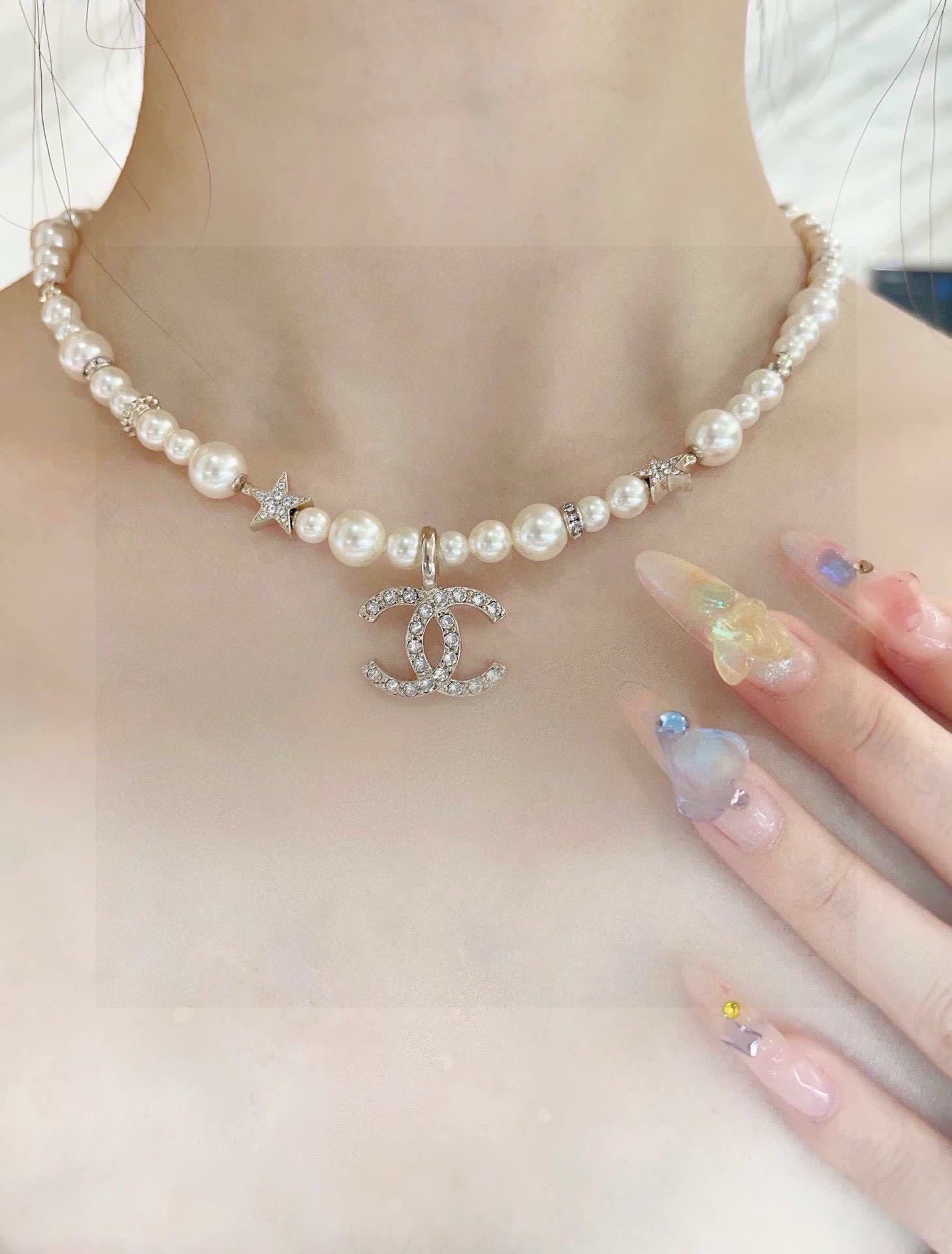 Chanel Pearl Necklace with CC Logo and Stars