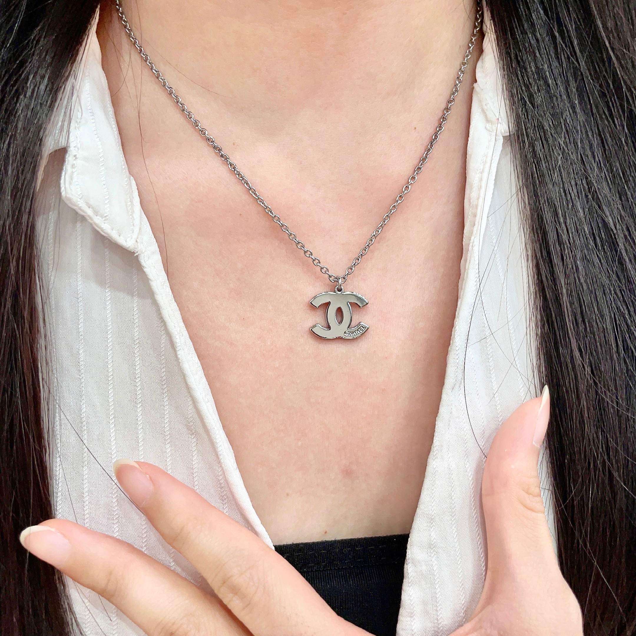 Chanel Silver Logo Necklace