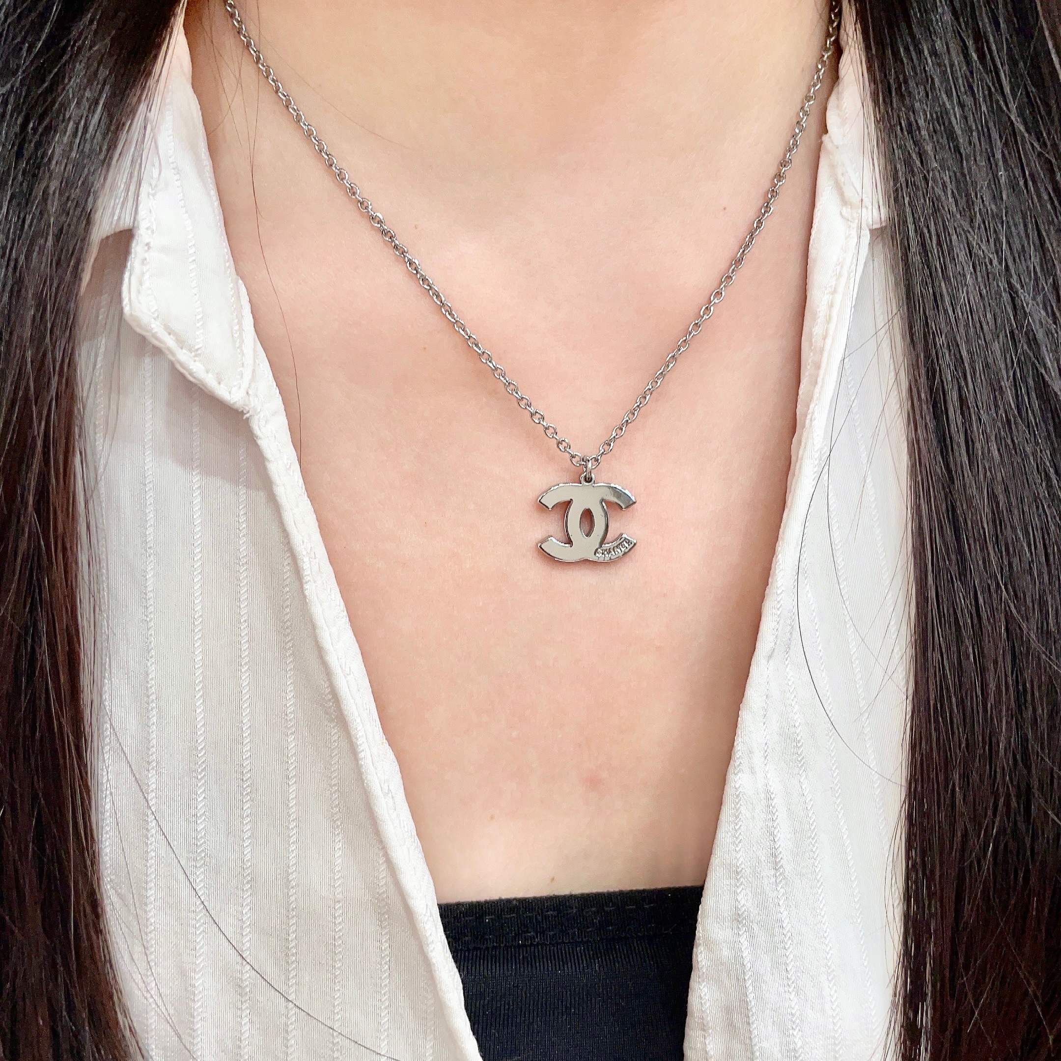 Chanel Silver Logo Necklace
