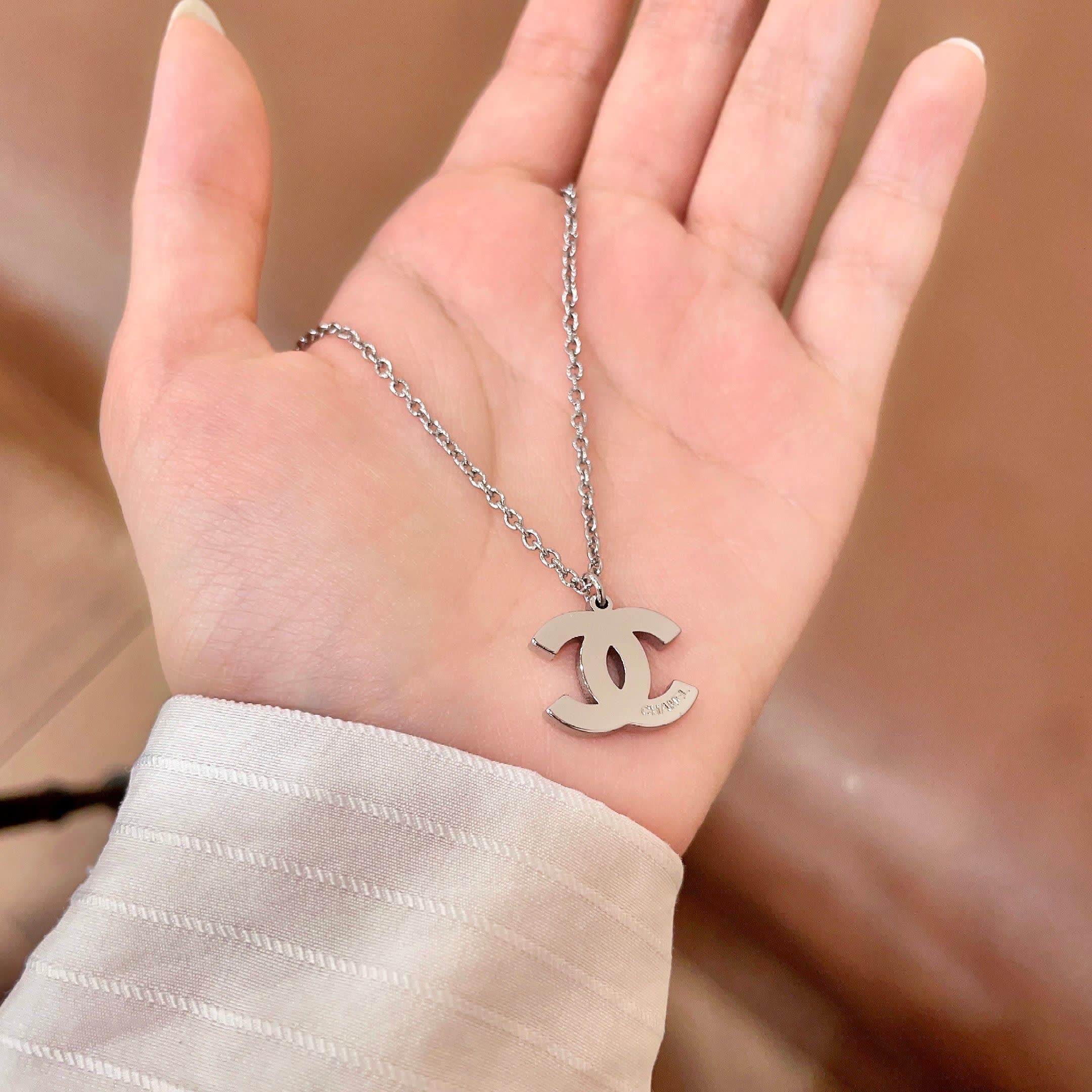 Chanel Silver Logo Necklace
