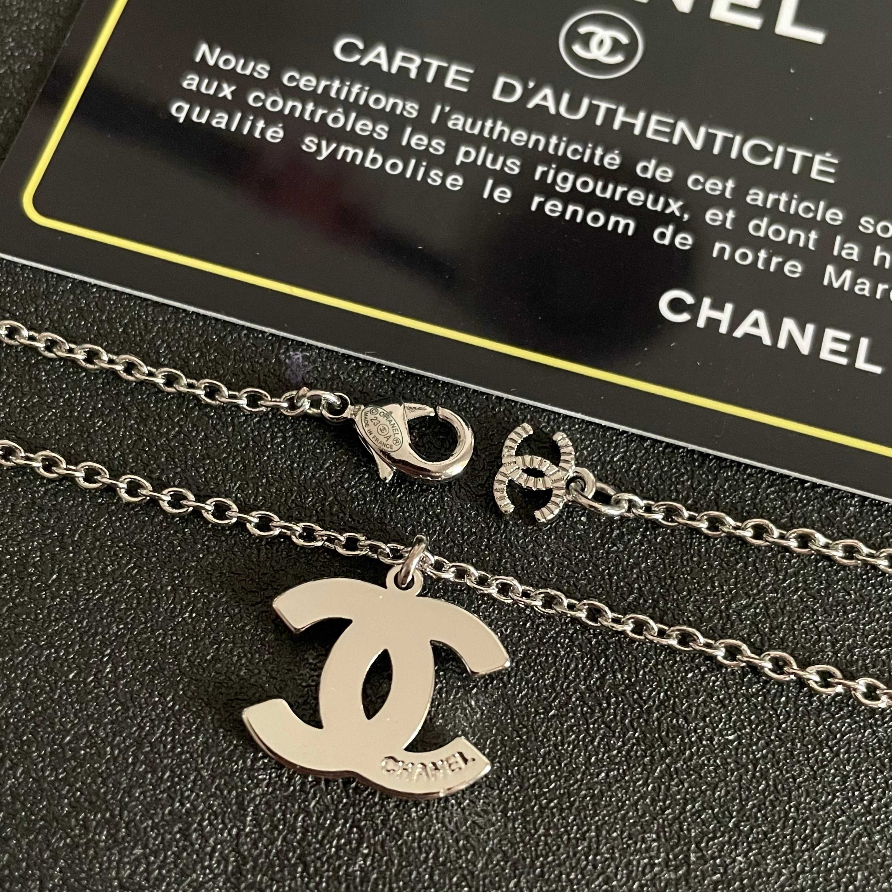 Chanel Silver Logo Necklace