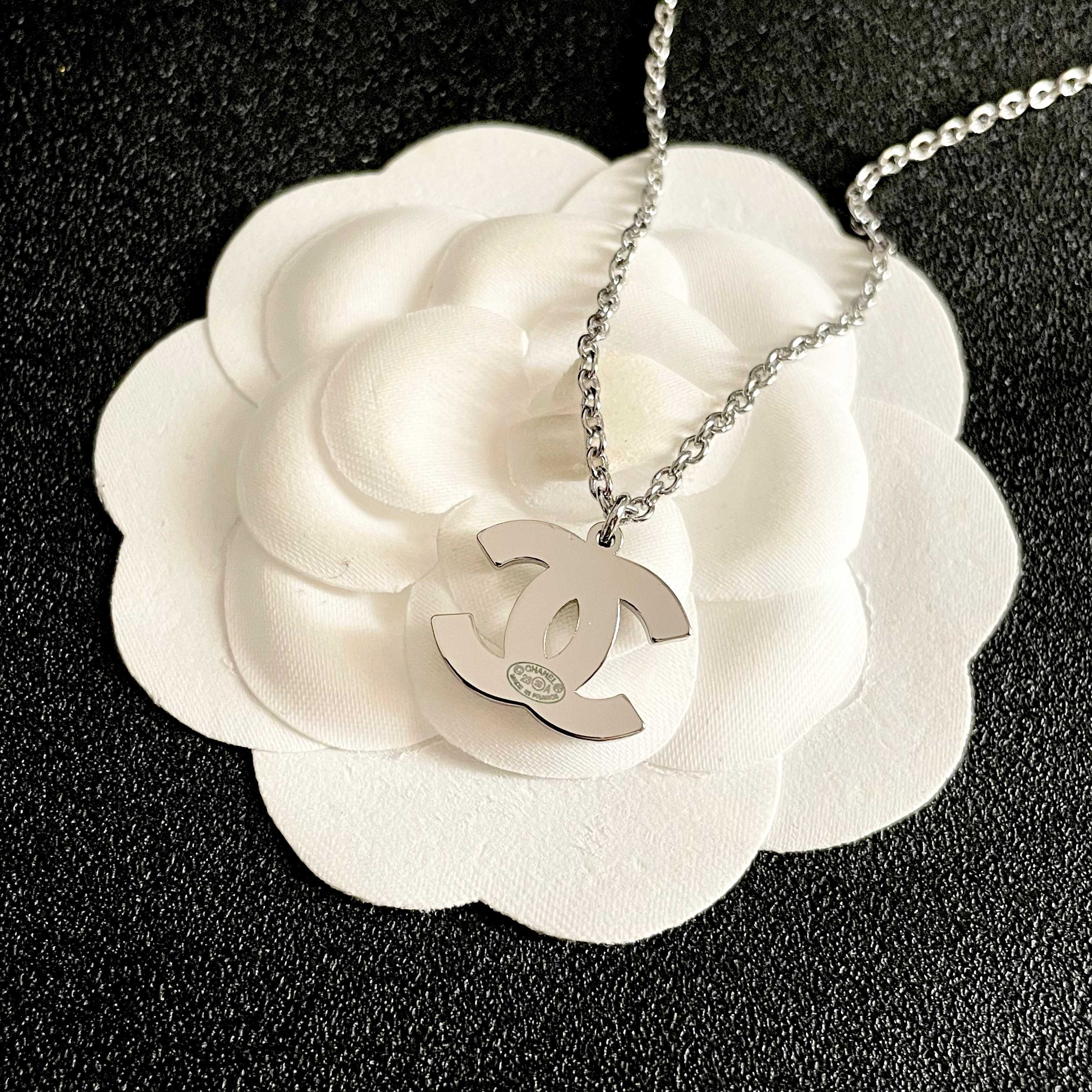 Chanel Silver Logo Necklace
