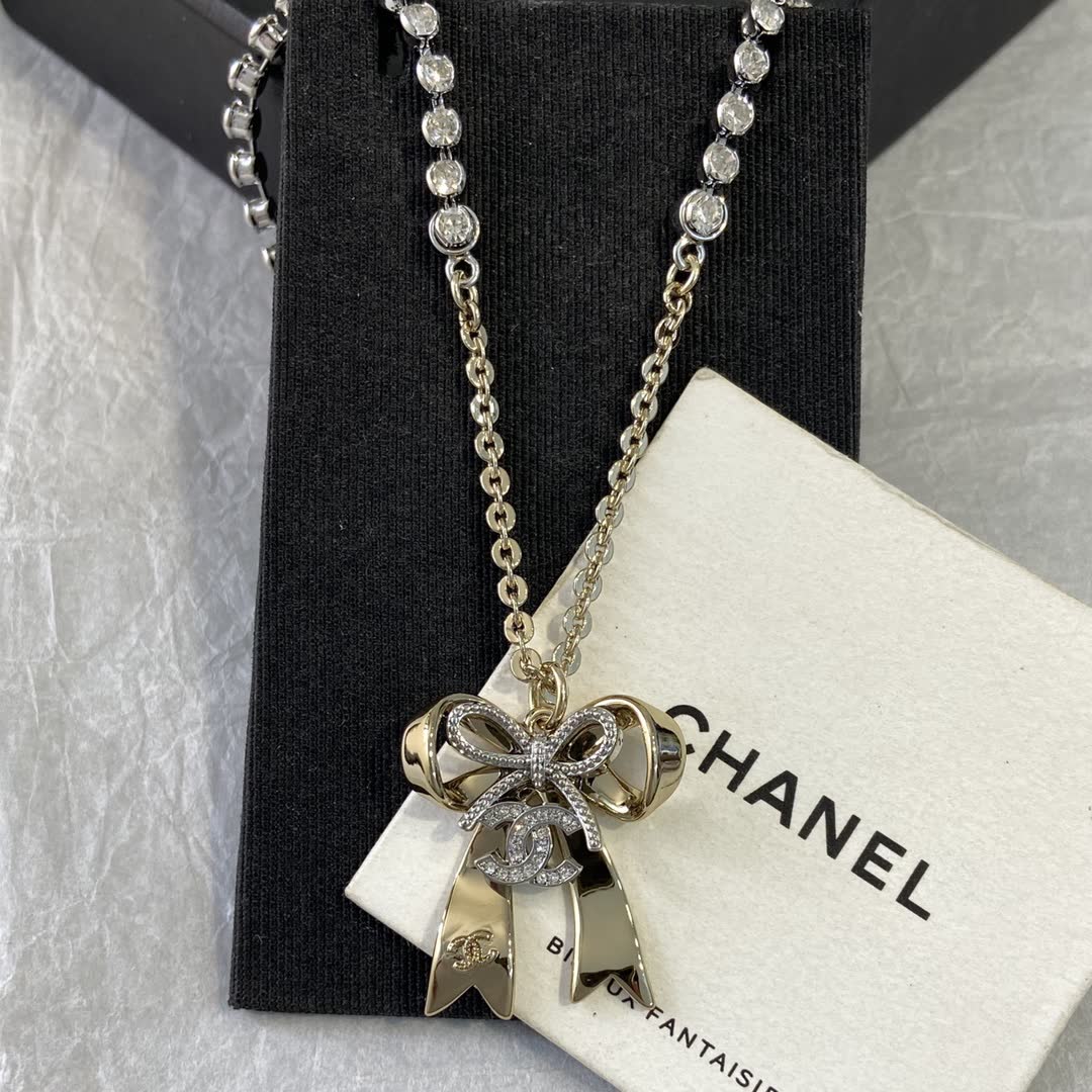 Chanel Gold Tone Crystal Bow Necklace
