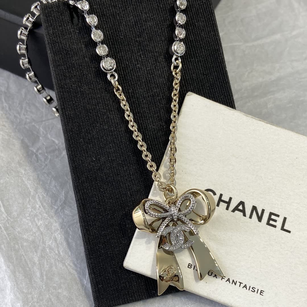Chanel Gold Tone Crystal Bow Necklace