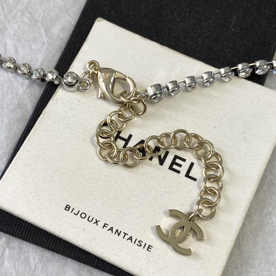 Chanel Gold Tone Crystal Bow Necklace