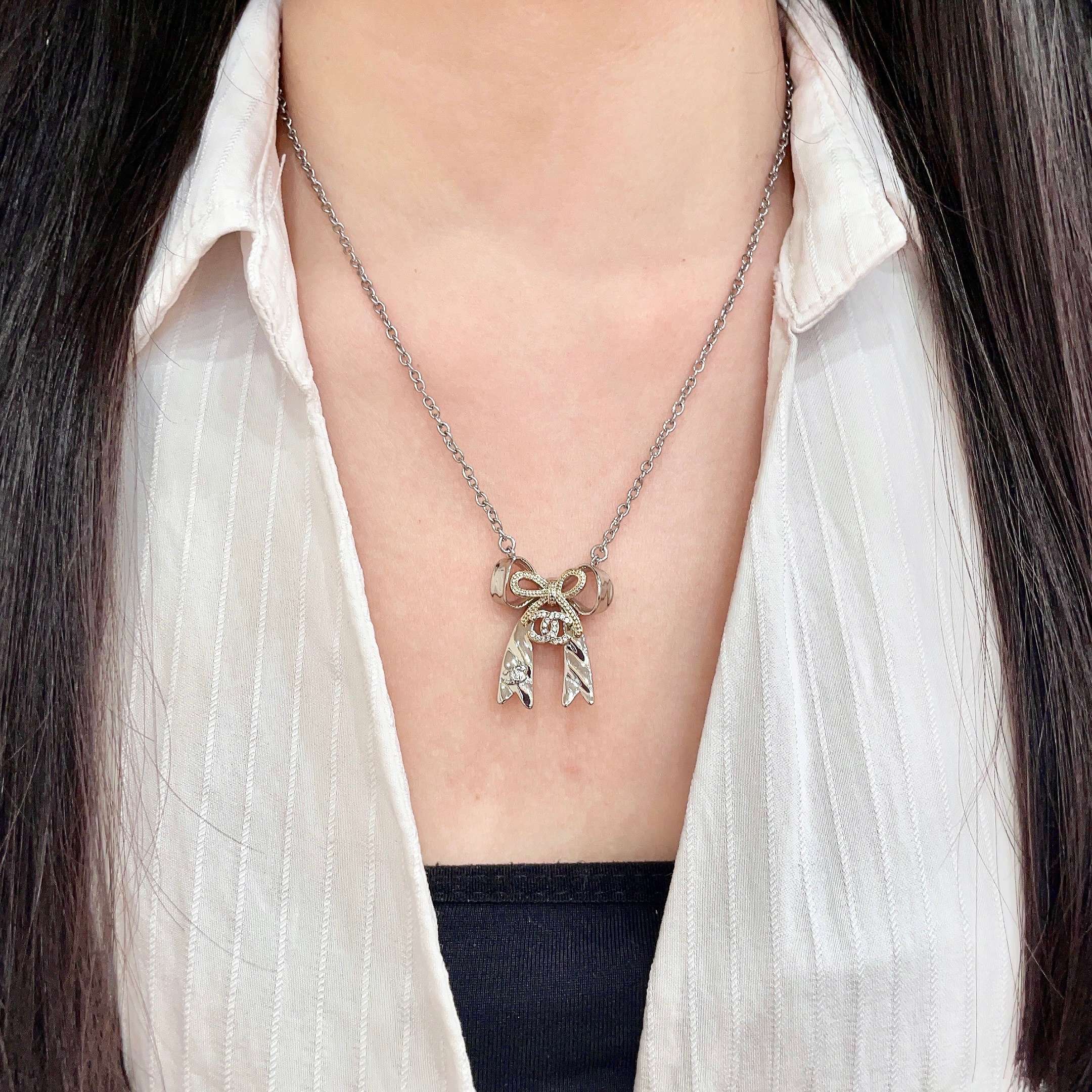 Chanel Silver Bow Tie Pendant Necklace