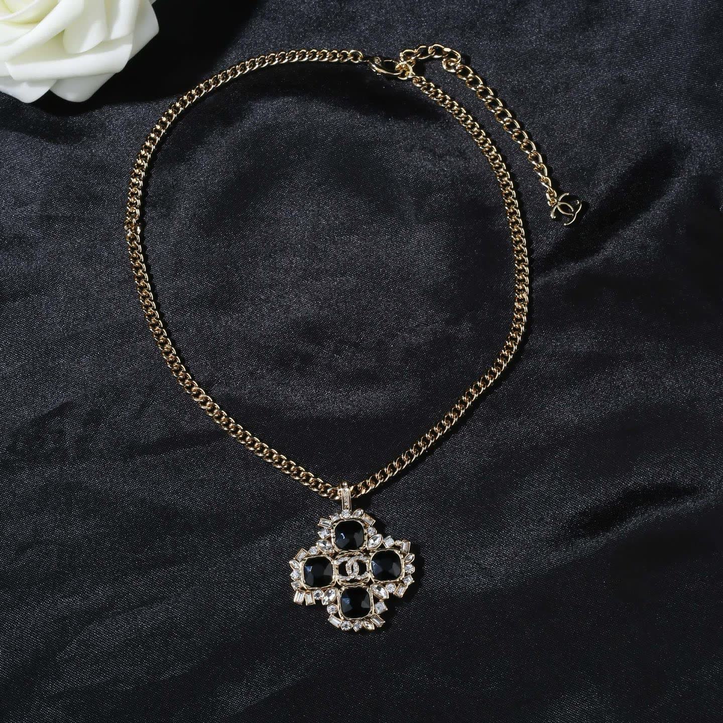 Chanel Elegant Gold and Black Gemstone Pendant Necklace