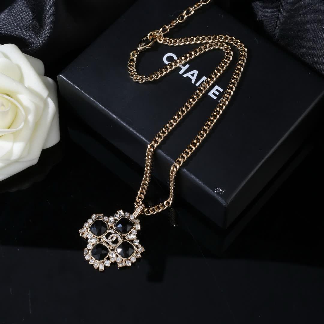 Chanel Elegant Gold and Black Gemstone Pendant Necklace