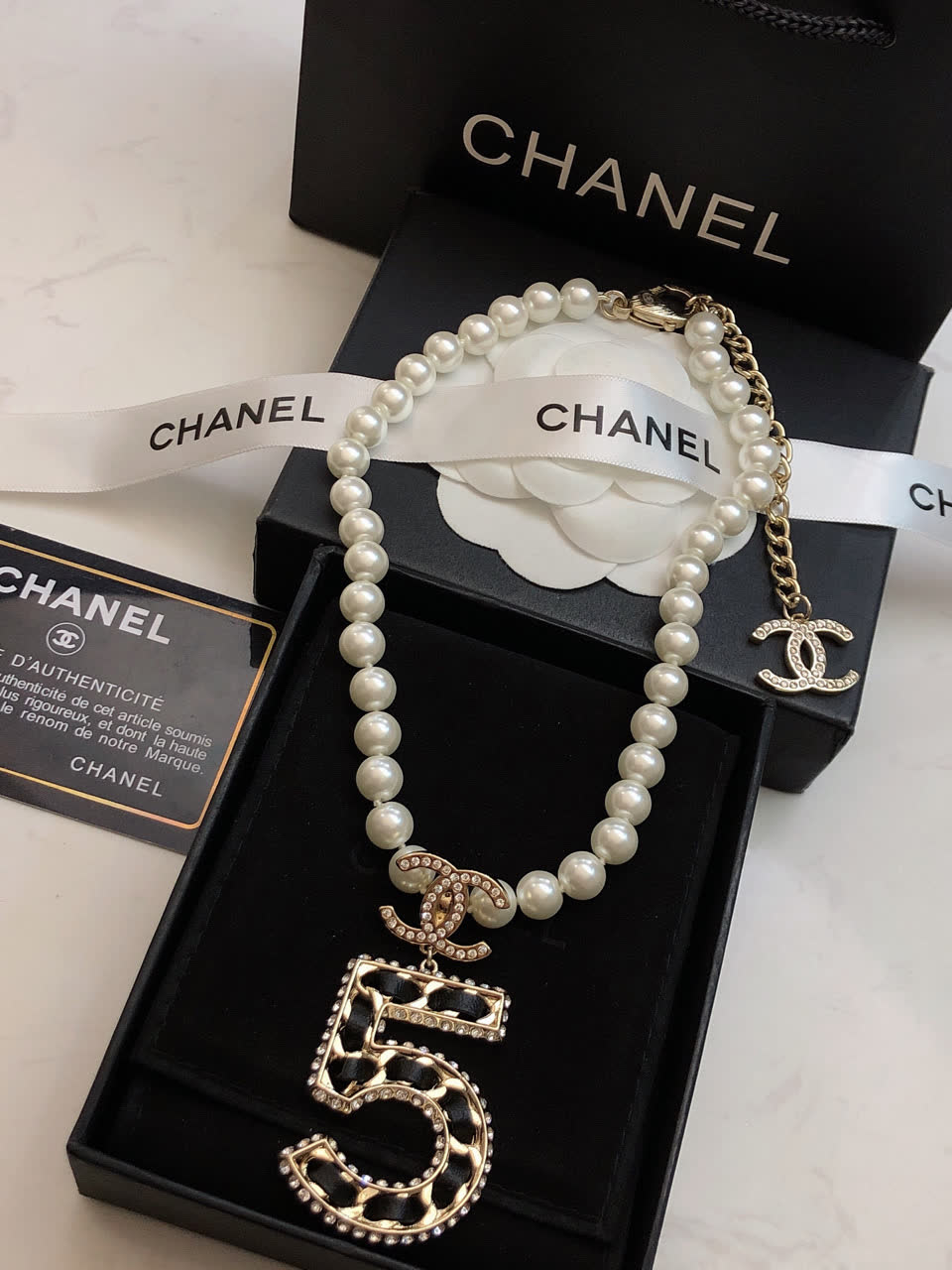 Chanel Pearl Necklace with Number 5 Pendant