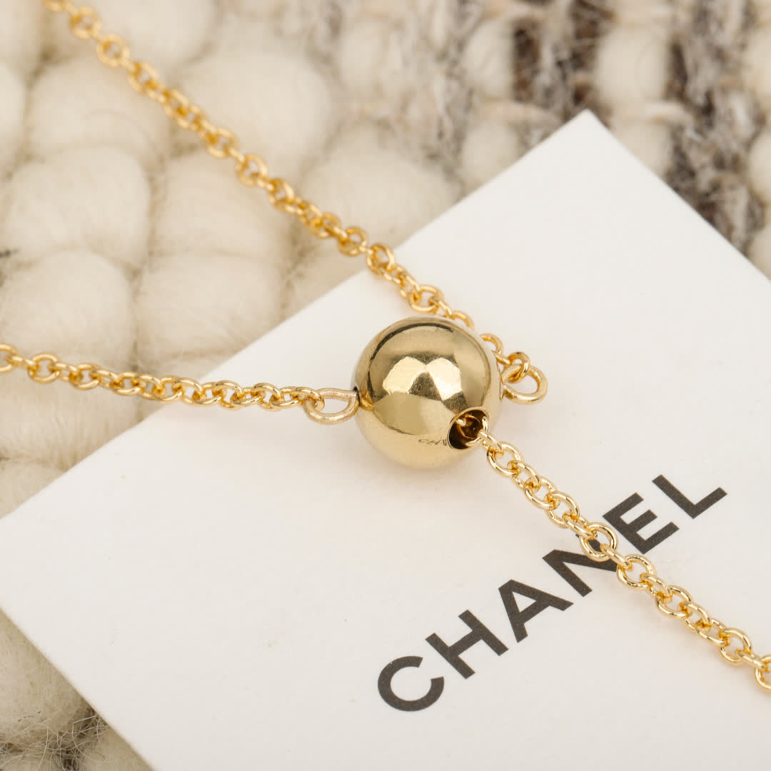 Chanel Anklet with Gold Chain and Black Bead