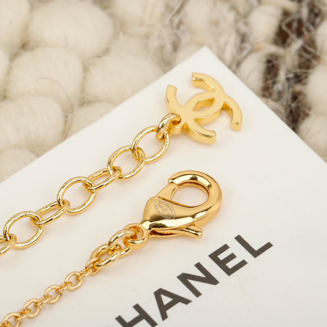 Chanel Anklet with Gold Chain and Black Bead
