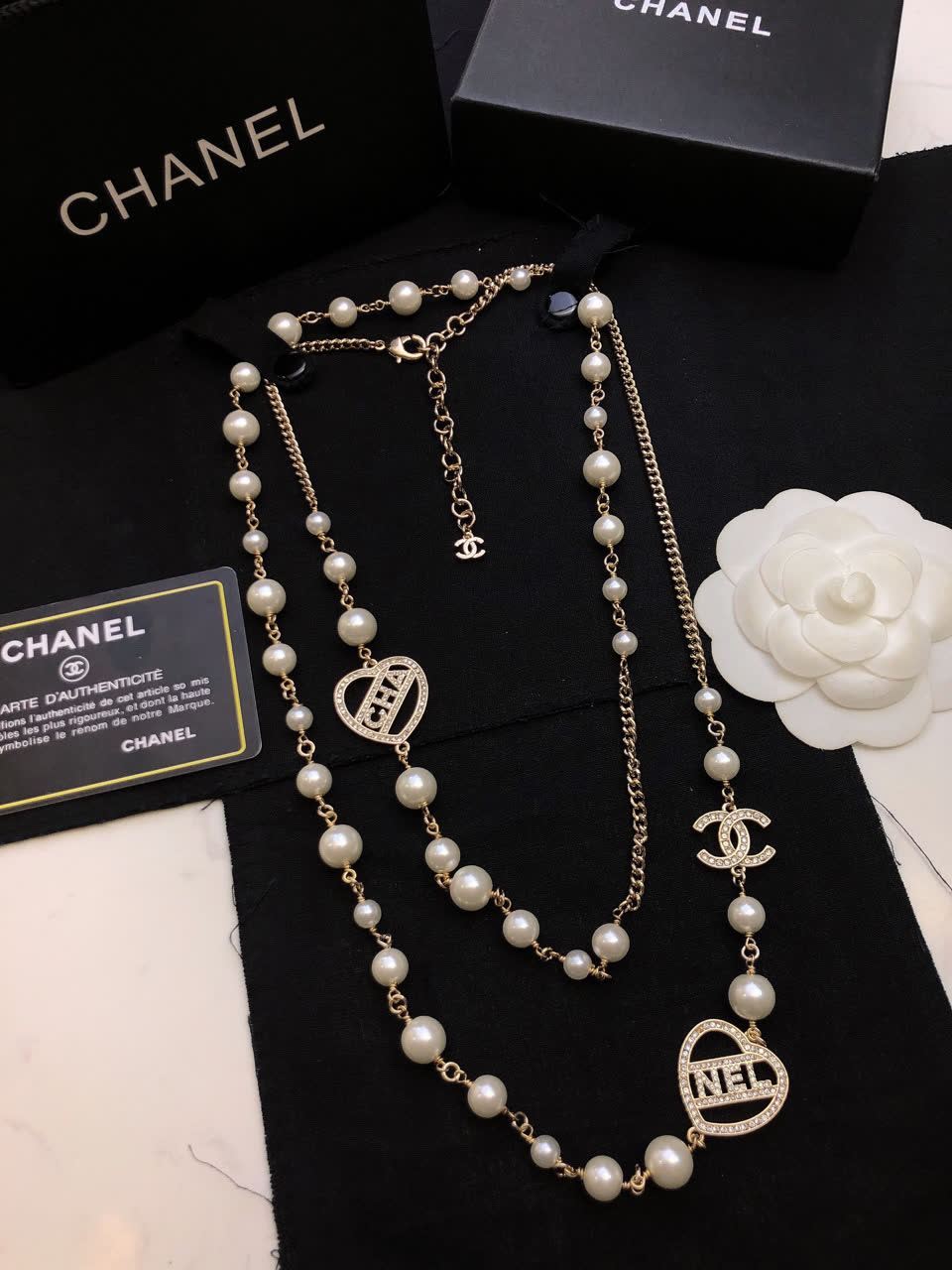 Chanel Pearl Necklace with CC and Heart Charms