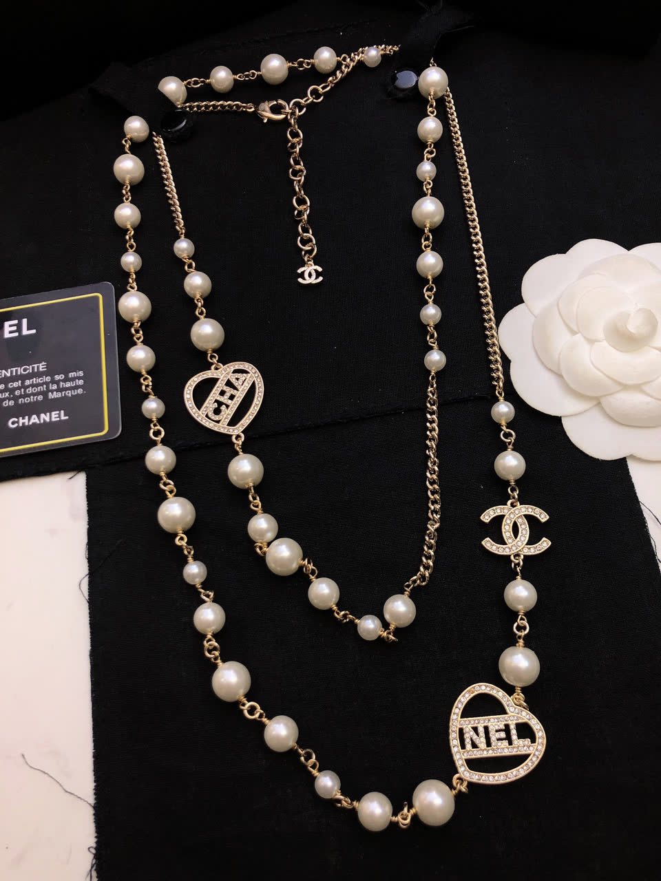 Chanel Pearl Necklace with CC and Heart Charms