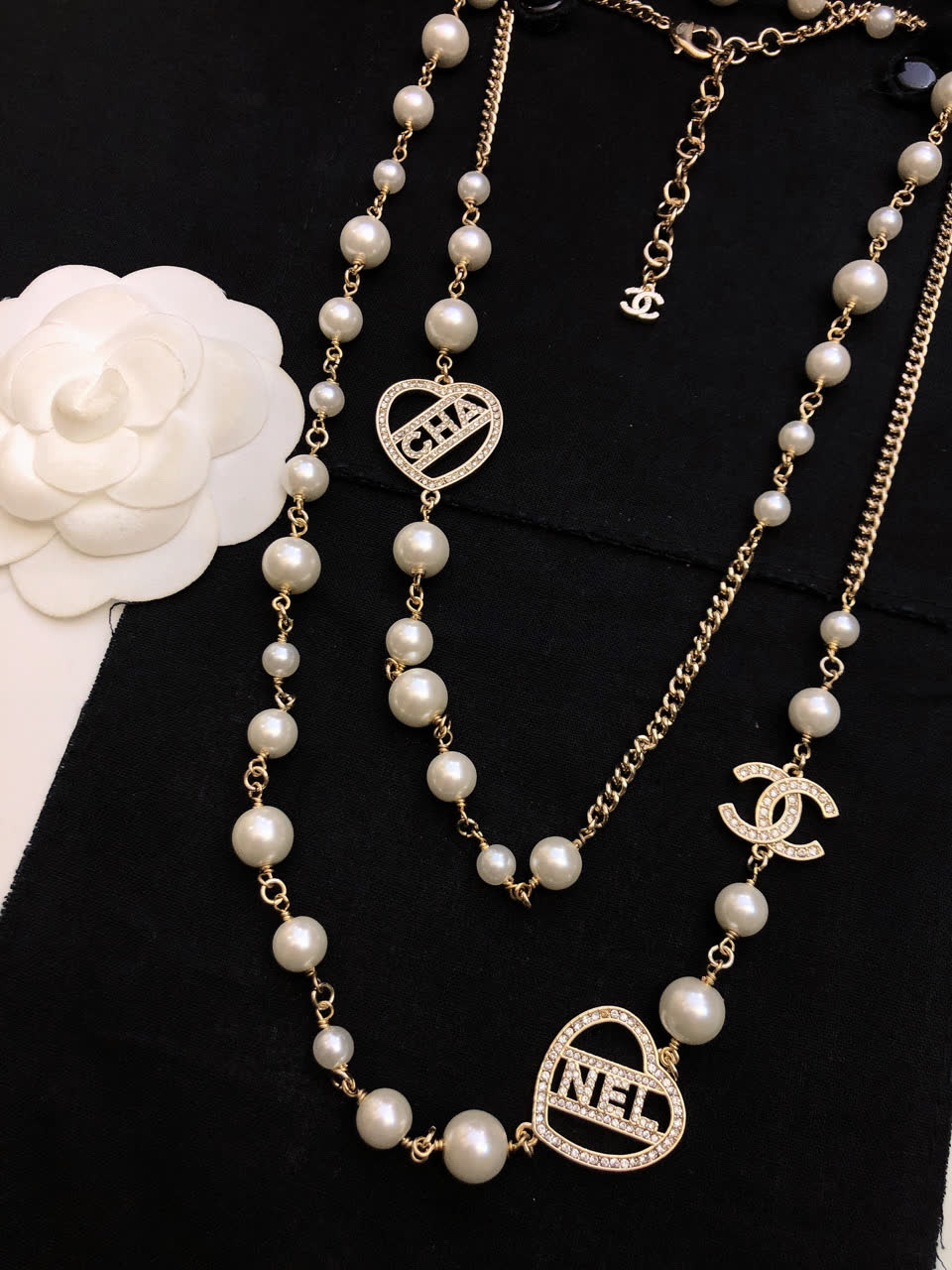 Chanel Pearl Necklace with CC and Heart Charms