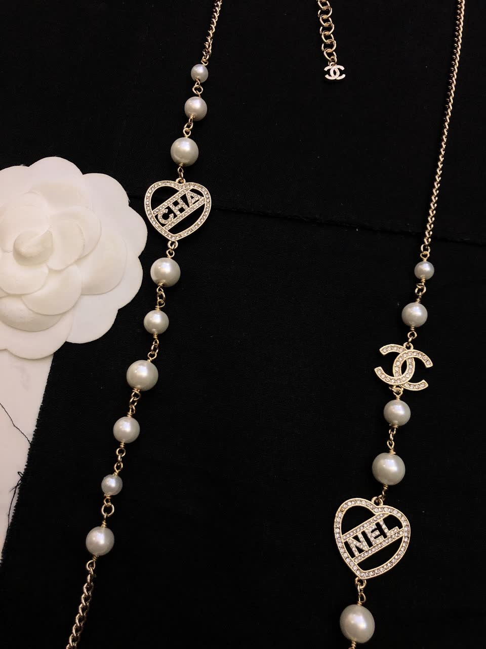 Chanel Pearl Necklace with CC and Heart Charms